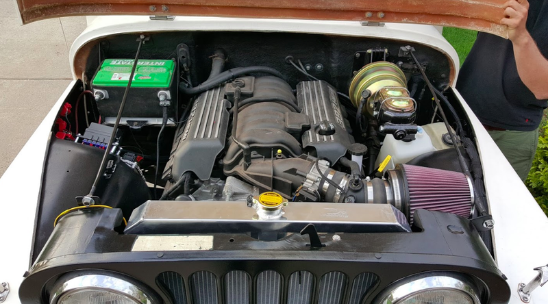 Illustration for article titled This Chrysler Engineer Is Shoving A 485 Horsepower Hemi V8 Into A Jeep Scrambler